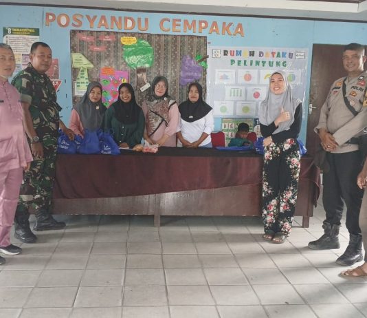Babinsa Pelintung Dampingi Penyaluran Makanan Bergizi Gratis di Medang Kampai