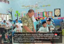 Babinsa Bukit Kapur Dampingi Penyaluran Makan Bergizi Gratis untuk 1.719 Siswa di Dumai
